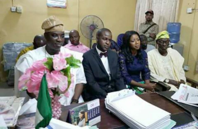 L-R: King Wasiu Ayinde Marshal, Yomade Marshal, Fatima and her parent…at the Registry…