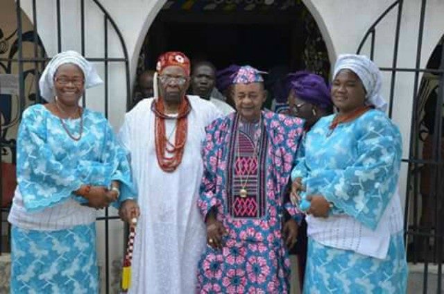 The Alaafin of Oyo with his guest and his wives...