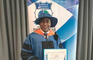 UK-Based Public Speaker, Dayo Olomu Bags Fellowship Dr Dayo Olomu...displays his newest certificate....