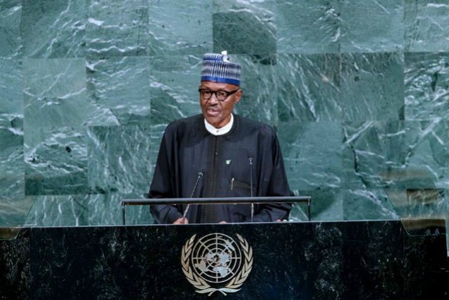President Muhammadu Buhari, reading his speech on Tuesday...