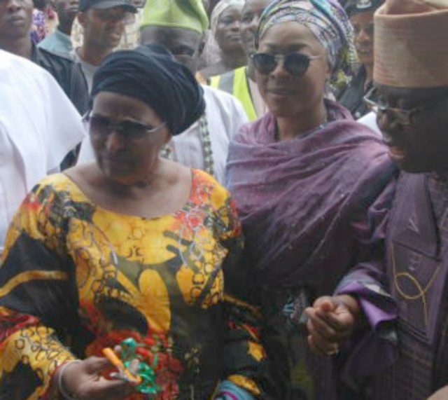 Senator Sojo Akanbi, right, with others during the handing over of the school...on Monday...