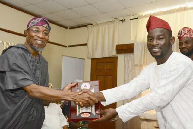 Governor State of Osun, Ogbeni Rauf Aregbesola receiving the award from the President, Yoruba Student Association of Nigeria in Egypt, Mr Bolajoko Ololade Uthman, at the Government Secretariat, Abere, Osogbo…