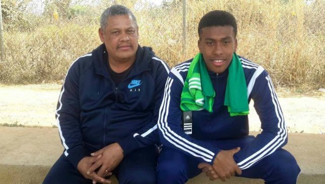 Alex Iwobi, right, with his father
