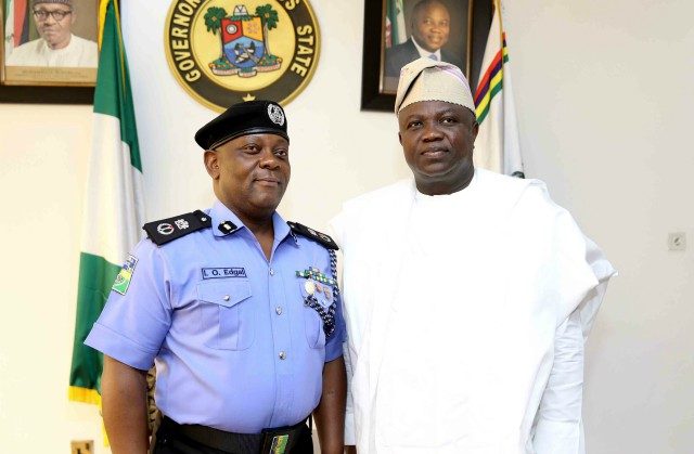 Lagos Compol, Edgal Imohimi, left, with the state's Governor Akinwunmi Ambode...