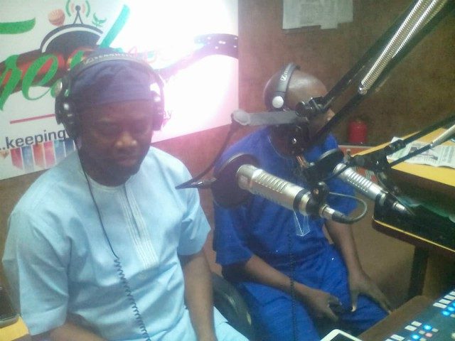 Engr Seyi Makinde, left, with Isaac Brown, during the programme...