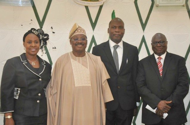 L-R: One of the new Judges of Oyo State High Court, Justice Adenike Adeeyo; state Governor, Senator Abiola Ajimobi; the second new judge, Justice Adebukola Lajide; and the state's Chief Judge, Justice Munta Abimbola, during the inauguration at the Executive Chamber of the Governor’s office, in Ibadan...