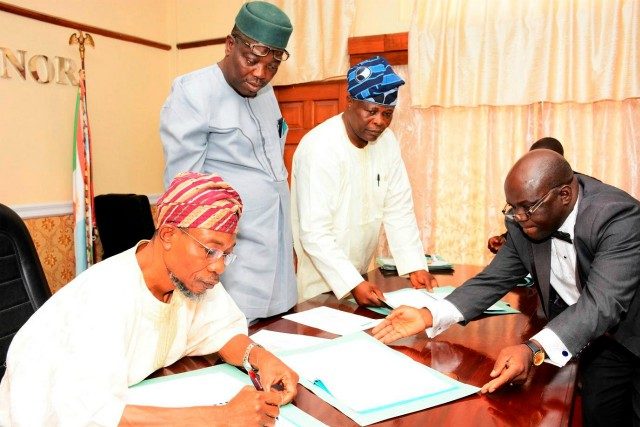 From the left: Governor State of Osun, Ogbeni Rauf Aregbesola, Commissioner for Environment and Sanitation, Hon. Idowu Korede, Senior Special Adviser On Osun Weste Management Agency, Alhaji Ganiyu Oyeladun, and Acting Solicitor General, Adedapo Adeniji, during the Signing of the Memorandum of Understanding (MoU)