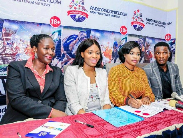 Actress, Eniola Ajao, second from the right, puts pen to paper to become the Brand Ambassador of PaddyPaddyBet...
