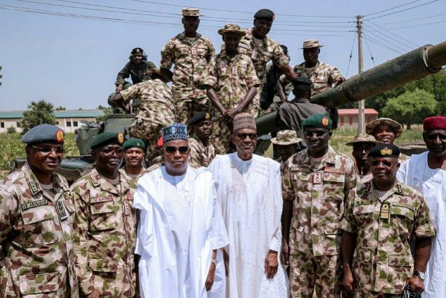 President Muhammadu Buhari, with gallant Nigerian military top shots...in Maiduguri on Sunday...