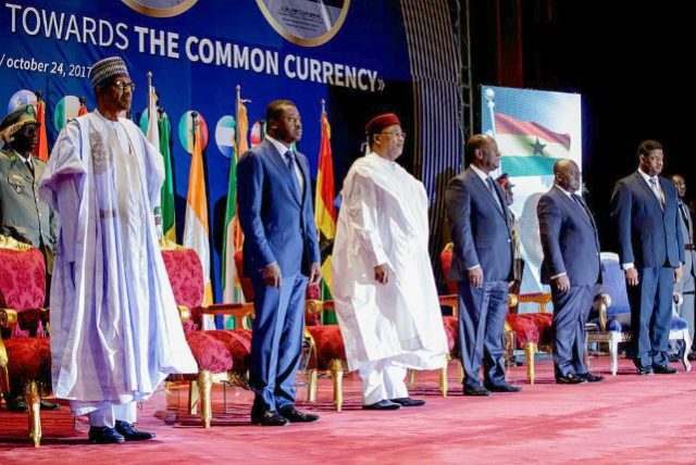 President Muhammadu Buhari, left, with other ECOWAS leaders...