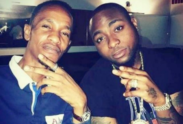 Late Tagbo, left, with Davido...