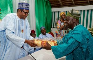 Photo: When Buhari Met With Nigerians In The Diaspora In Abidjan President Muhammadu Buhari receives a gift from the representatives of Nigerians in the diaspora in Abidjan…