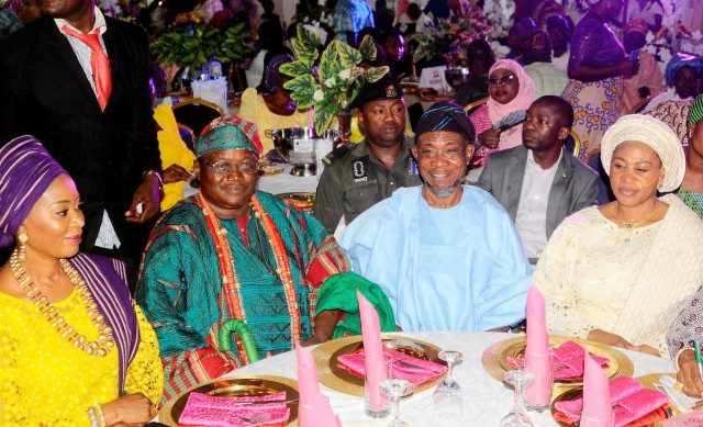 Governor State of Osun, Ogbeni Rauf Aregbesola (2nd right), his wife Mrs Sherifat (right); the Ataoja of Osogbo, Oba Jimoh Olanipekun (2nd left) and wife of Ogun State Governor, Mrs Funsho Amosun, during the wedding ceremony of Mr & Mrs Ibrahim Oyetunji Son of the Ataoja at the Distinguish Events Center Iwo road Osogbo…