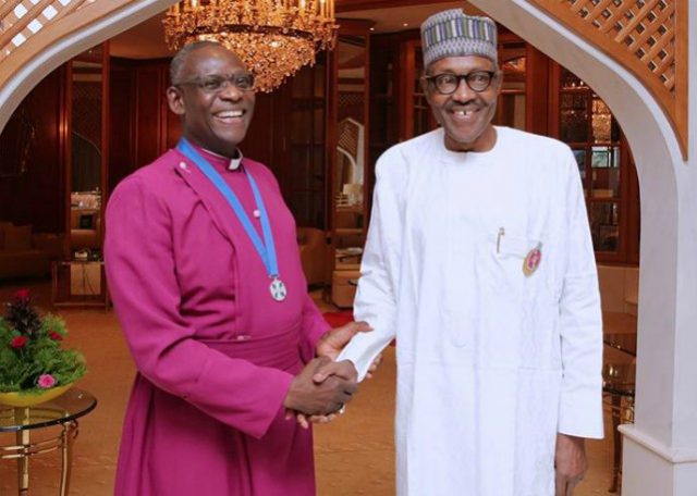 President Muhammadu Buhari, right, with his Archbishop guest...