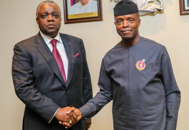 Vice President Yemi Osinbajo, right, with his guest...