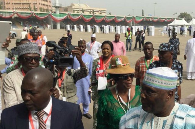 PDP strongman, Alhaji Atiku Abubakar, right, on ground at the Eagle Square in Abuja...