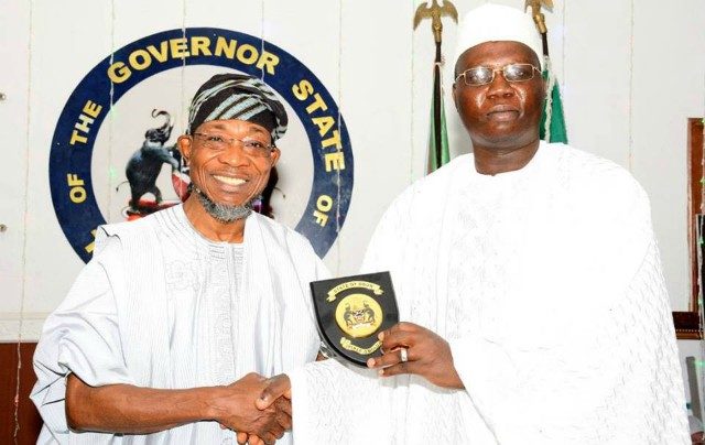 Governor Rauf Aregbesola, right, with Aare Gani Adams when they met on Wednesday in Osogbo...