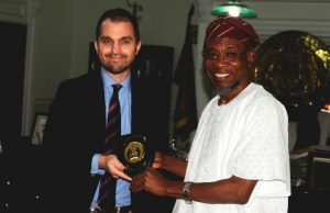 Photo: When Aregbesola Hosted US Consulate Team In Osogbo Osun Governor, Ogbeni Rauf Aregbesola, right, presenting a gift to the Political & Economic Officer, United State Consulate, Mr. Ben Williams, during the visit…