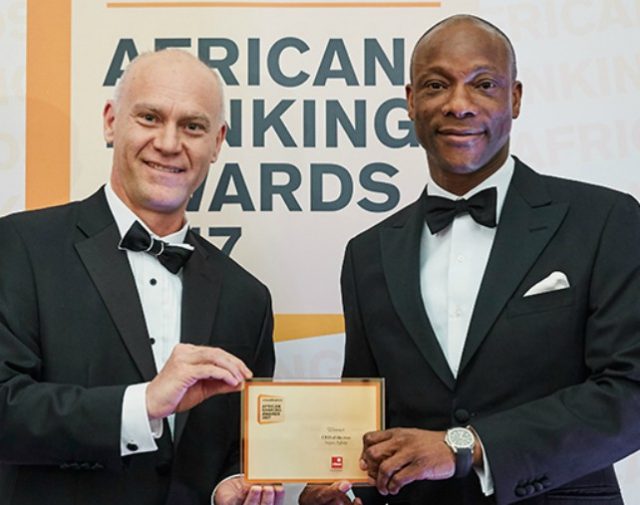 Segun Agbaje, right, receives his award at the event...