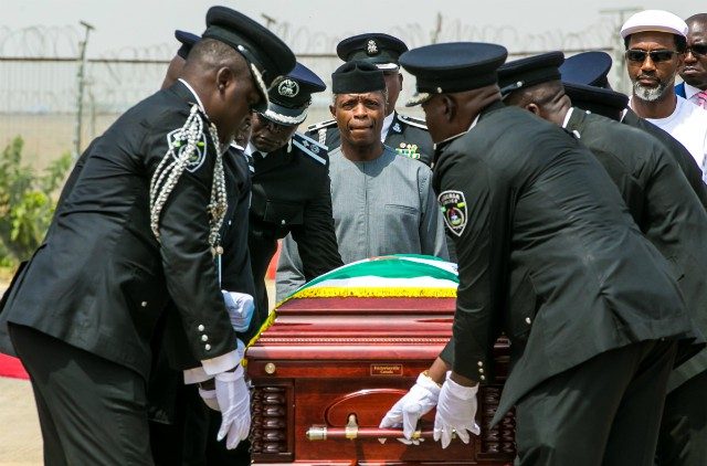 Vice President Yemi Osinbajo, middle, paying last respect to the remains of Dr Alex Ekwueme, former Vice President...