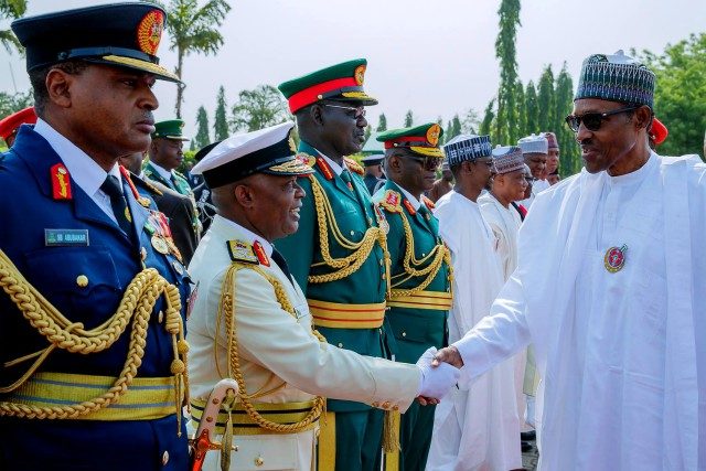 President Muhammadu Buhari, right, with Service Chiefs...