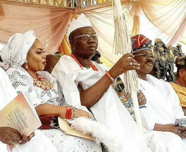 Aare Gani Adams, middle, with his wife and Governor Abiola Ajimobi at the installation...