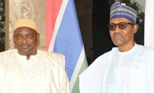 Gambia's President Adama Barrow, left, with President Muhammadu Buhari in Abuja on Tuesday...
