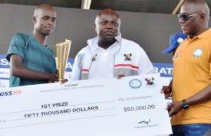 Lagos City Marathon Holds, Ambode Charges Athletes Governor Akinwunmi Ambode hands over the prize to the winner...