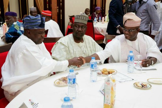 Governor Akinwunmi Ambode, left, with others at the meeting...