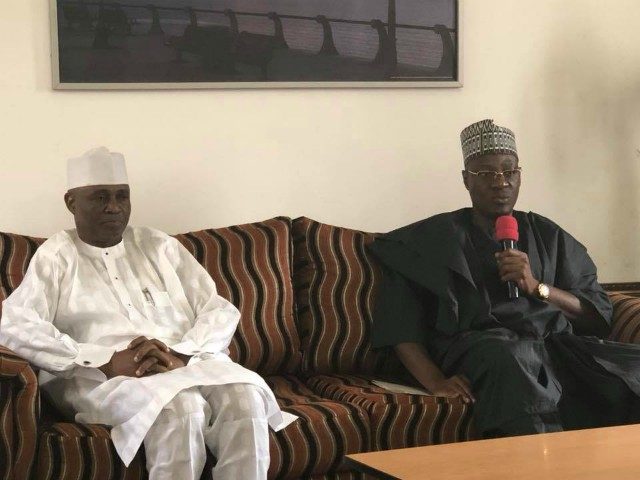 Dr Abdulfatah Ahmed, right, with Hon Shittu...during the visit...