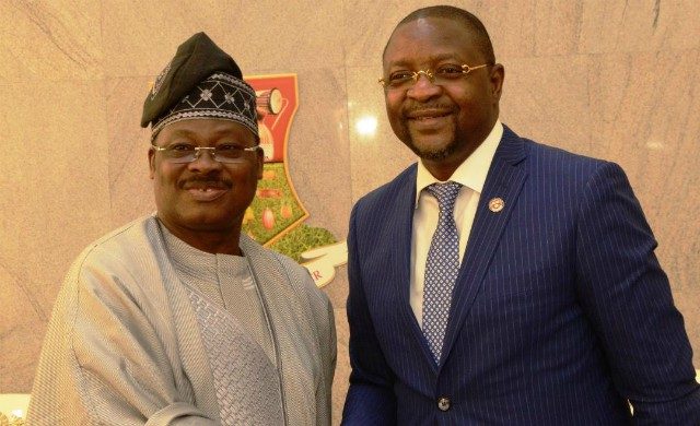 Oyo State Governor, Senator Abiola Ajimobi, left, with the Executive Commissioner, Stakeholders' Management, Nigerian Communications Commission, Mr. Sunday Dare, during the visit…