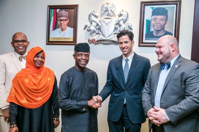 VP Osinbajo in an handshake with Daniel Twinning, President of the International Republican Institute shortly after the meeting flanked by John Tomazewski, Africa Regional Director of IRI; Sentelle Barnes, Resident Prog. Dir; (extreme left) and Husna Hassan, Resident Prog. officer…