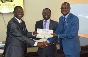 Tech-U Staff Tasked By Former UI Registrar, Moji Ladipo Vice-Chancellor, Tech-U, Professor Ayobami Salami presenting a certificate to the Registrar, Mr. A.A Oladeji as Mr. Ayo Ogunruku looks on...
