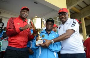 Again, Nigeria Oil & Gas Games Won By Shell L-R: General Manager External Relations of Shell Petroleum Development Company (SPDC), Mr. Igo WelI; Group Managing Director of Nigeria National Petroleum Corporation, Dr. Maikanti Baru; and SPDC Community Relations Coordinator and Vice Chairman Nigeria Oil and Gas Industry Games (NOGIG) Organising Committee, Mr. Alex Onumbu, at the presentation of the 2018 NOGIG Overall Tournament Champion trophy to SPDC in Lagos…