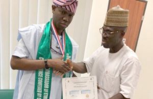 Dapo Lam Bags Another Award, Becomes Ambassador Of Ethics & Conscience Hon. Adedapo Lam Adesina, left, receiving his Award Certificate from Prince Salih Musa Yakubu