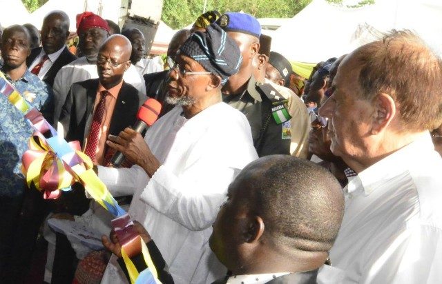 Osun Governor, Ogbeni Rauf Aregbesola, commissioning the Lakeside Resort Restaurant…with him are the site contractor manager, Managing Director Tecno Katagum Construction Company Ltd., Mr. Alexander Iltchev and others during the event…
