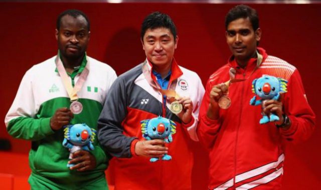 L-R: Silver medalist Quadri Aruna of Nigeria, gold medalist Ning Gao of Singapore and bronze medalist Sharath Achanta of India after the Table Tennis Men's Singles Gold Medal match between Quadri Aruna of Nigeria and Ning Gao of Singapore on day 11 of the Gold Coast 2018 Commonwealth Games…