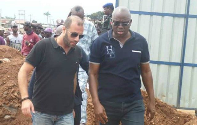 Governor Ayodele Fayose, right, inspecting one of his projects in Ekiti State...