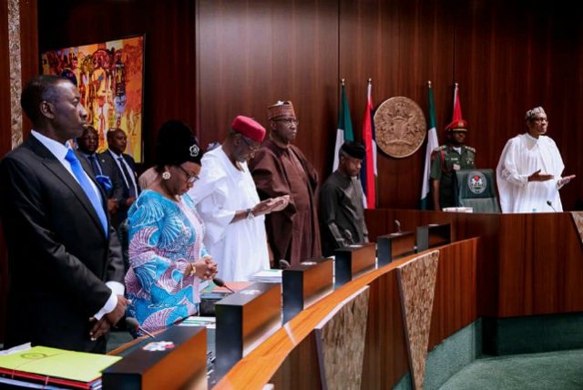 Federal Executive Council in session with President Muhammadu Buhari, right, presiding...