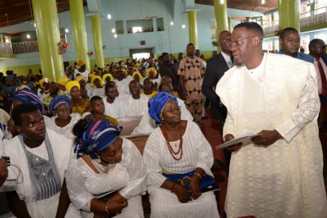 Governor Abdulfatah Ahmed, right, during the church service...