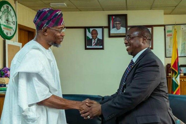 Governor Rauf Aregbesola of the State of Osun, exchanging pleasantries with the General Managing Director of NNPC, Dr Maikanti Baru, during the visit at the NNPC Towers in Abuja…