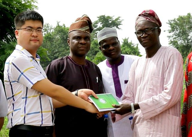 The Oyo State Hon. Commissioner for Environment & Water Resources, Chief Isaac Ishola (Right), handing over the Eleyele Dam site to a representative of Messrs CGC-CHWE, Mr. Lee, while the Permanent Secretary of the Ministry, Mr. Gabriel Oguntola (2nd Right) and the Project Coordinator of IUFMP, Mr. Dayo Ayorinde, watch with admiration…