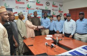 Simba Motorcycle, Tricycle Join Super Eagles Family Simba Group and NFF officials at the event...