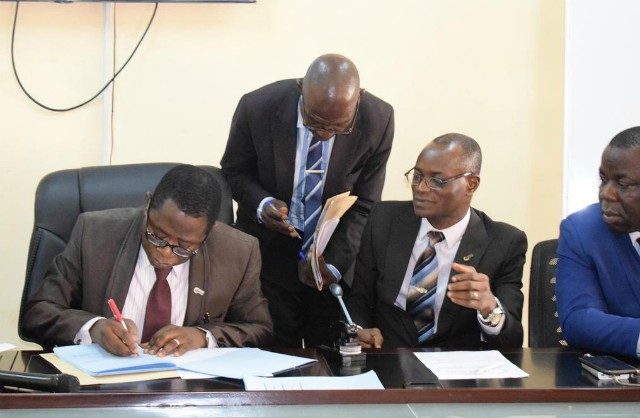 Tech-U Vice-Chancellor, Professor Ayobami Salami signs the MoU as the Senior Assistant Registrar, Mr. Adeyemi Opakunle, the Registrar, Mr. Alex Oladeji and Chairman of the NSE, Oluyole Branch, Engr. Ademola Agoro watch with keen interest