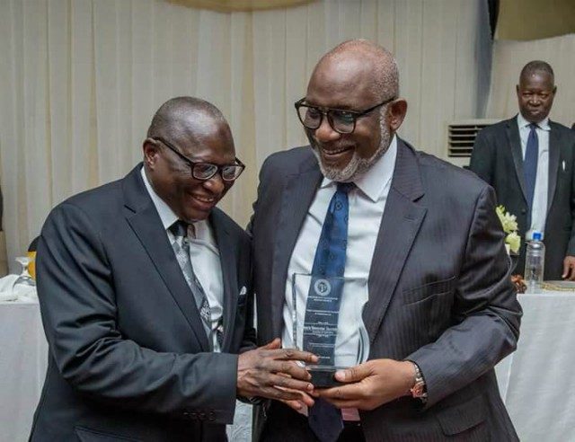 Governor Oluwarotimi Akeredolu, right, receives his plaque from Justice Munta Abimbola, the Chief Judge of Oyo State...at the occasion...