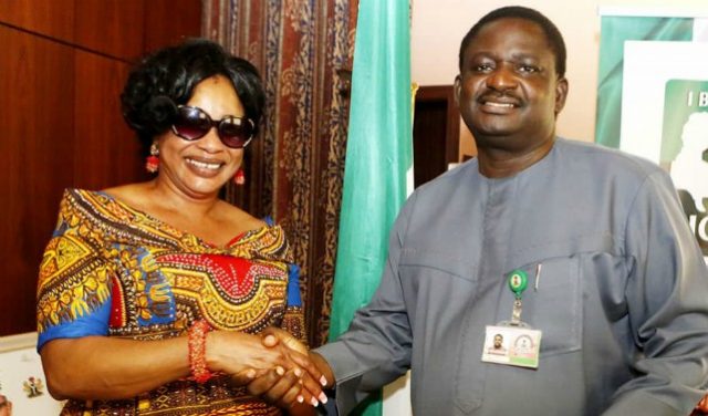 Femi Adesina, right, with his August visitor in the month of May, Clarion Chukwurah...