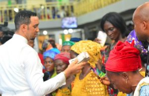 Birthday: Day Widows, Orphans Were Empowered With Millions By Dr Chris Okafor Dr Chris Okafor, left, giving out to widows...