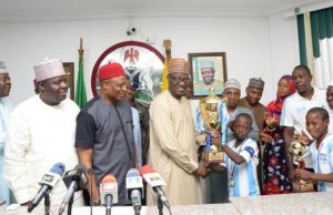 Channels Kids Cup: Victorious Kwara Team Excites Governor Ahmed, I’m Proud Of You Governor Abdulfatah Ahmed, centre, felicitating with the victorious team...