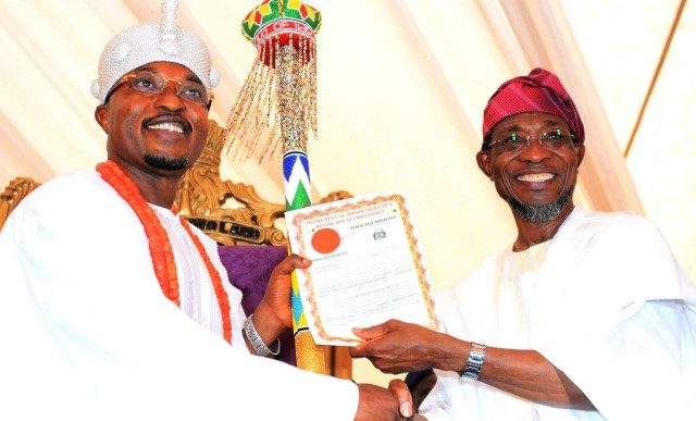 Governor Rauf Aregbesola, right, with the Oluwo of Iwo...