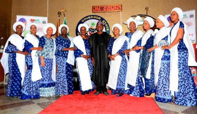Governor Rauf Aregbesola of Osun State (middle); his wife, Alhaja Sherifat Aregbesola (5th right); wife of Ogun State Governor, Mrs Olufuso Amosun (3rd right); Wife of Akwa Ibom State Governor, Mrs Martha Emmanuel (3rf left); wife of Ekiti State Governor, Mrs Feyisetan Fayose (left); wife of Enugu State Governor, Mrs Monica Ogwuanyi (2nd left); wife of Lagos State Governor, Mrs Bolanle Ambode (4th right); wife of Delta State Governor, Mrs Dame Edith Okowa (right); wife of Edo State Governor, Betsy Obaseki (5th left); wife of Oyo State Governor, Mrs Florence Ajimobi (2nd right); wife of Abia State Governor, Mrs Nkechi Caroline Ikpeazu (4th left); during the visit…